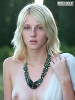 Yummy blonde gets nude in a public place and shows all her private parts for the camera.