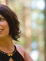 Hot girl takes off her dress while walking in the woods and shows off her tits and pussy.