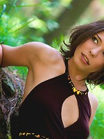 Hot girl takes off her dress while walking in the woods and shows off her tits and pussy.