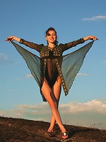 Hot babe enjoys posing and stripping outdoors and exposing her perfect tits and fine ass.