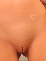 Alison Angel speads her shaved pussy wide