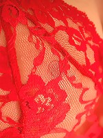 Alison Angel poses in sexy red stockings