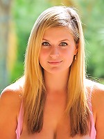 Danielle plays with the water hose