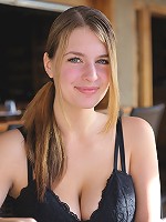 Danielle plays with a pregnant chick