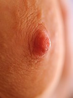 Danielle plays on her couch