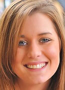 Hayley plays with some veggies