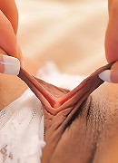 Annie plays with her pussy