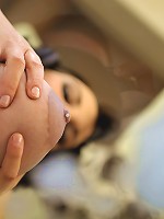 Julie milks her big natural boobs