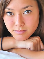 Miyu shows off her shaved pussy