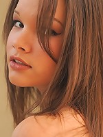 Jessy plays with her plump pussy