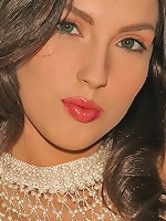 Hot Guinevere seductive in her fishnet dress playing her pussy with her fingers