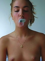 A naked girl and a little chewing gum strut their stuff for the camera.