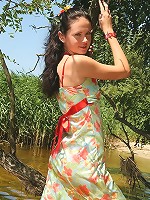 Sweet brunette teen poses naked outdoors