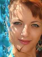 Cute redhead teen poses in tiny bikini