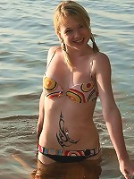 Sexy blonde teen gets horny out doors