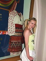 Cute blonde shows off her tiny panties