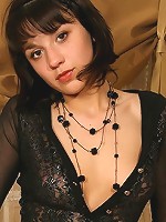 Sexy teen Inna slowly removes her sexy black dress, for your pleasure