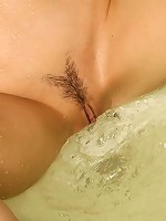 Petite teen gets wet