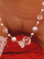 Teen shows off see-thru skirt and fishnet stockings