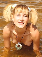 Sweet teen is naked on the beach