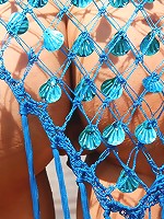 Sweet teen is naked on the beach