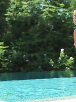 Kelly spreads her pussy at the pool