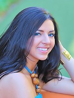 Madeline uses a dildo outside