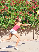 Valerie plays naked in a park