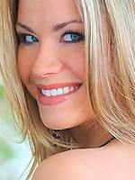 Carolyn gets naked outside