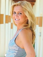 Ashley takes off her pants and rides dildo outside