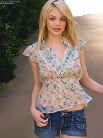 Lovely blonde Bree Daniels on the park teasing and posing in her lustry floral dress and shorts