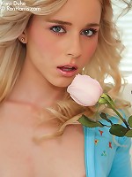 Angelic Kara bent over on the couch gets naughty stretching her tight ass and pussy