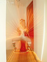 Kara in her sexy christmas outfit wrapped in lights spreading her pussy