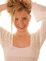 Kara in a fine sexy dress gets naughty and stuffs a dildo into her pussy on the chair