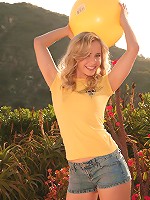 Sassy Kara playing in the garden with her ball gets naughty and strips naked