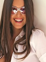 Erica in her sexy nurse outfit stuffing her favorite glass dildo into her awesome tight pussy