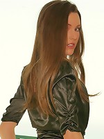 Awesome Erica slides off her black latex top flashing her lovely soft titties on the terrace