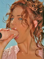 Naughty Riley Shy spit on her dildo then slides it into her tight pink hole