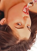 Sasha laid back on her bed takes off her sexy pink nightie and pounds her pussy with a glass dildo