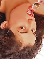 Sasha laid back on her bed takes off her sexy pink nightie and pounds her pussy with a glass dildo