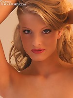 Lusty Cayenne lifting her white top in bed flashing her gorgeous small titties