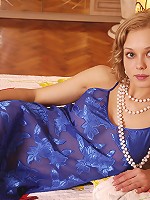 Blond Irka babe posing naked on the bed