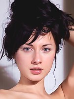 Brunette babe takes off her sexy silk bra and panties