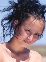 Sexy brunette showing her sexy tanlines