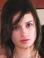 Dark-haired slut Tata dazzles in silky white stockings