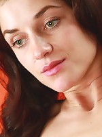 Brunette teen shows her perfect naked body