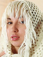 Petite blonde playing with her panties