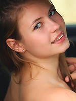 Curvy cutie Amy gets naked out by her red sportscar