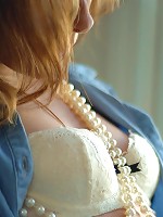 Taylor's lace panties slips down her to her ankles as she prepares to please herself by the window.