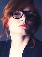 Patty confidently showcases her supple breasts with pink, puffy nipples.